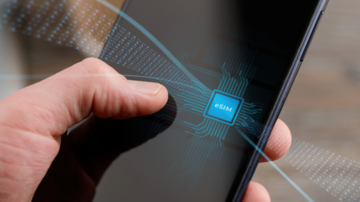 Mobile device with active eSIM, held and used by a person